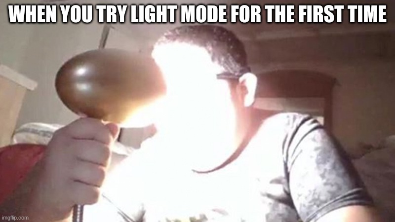 Meme of a person with a lamp light in the face, representing the filling of using light mode